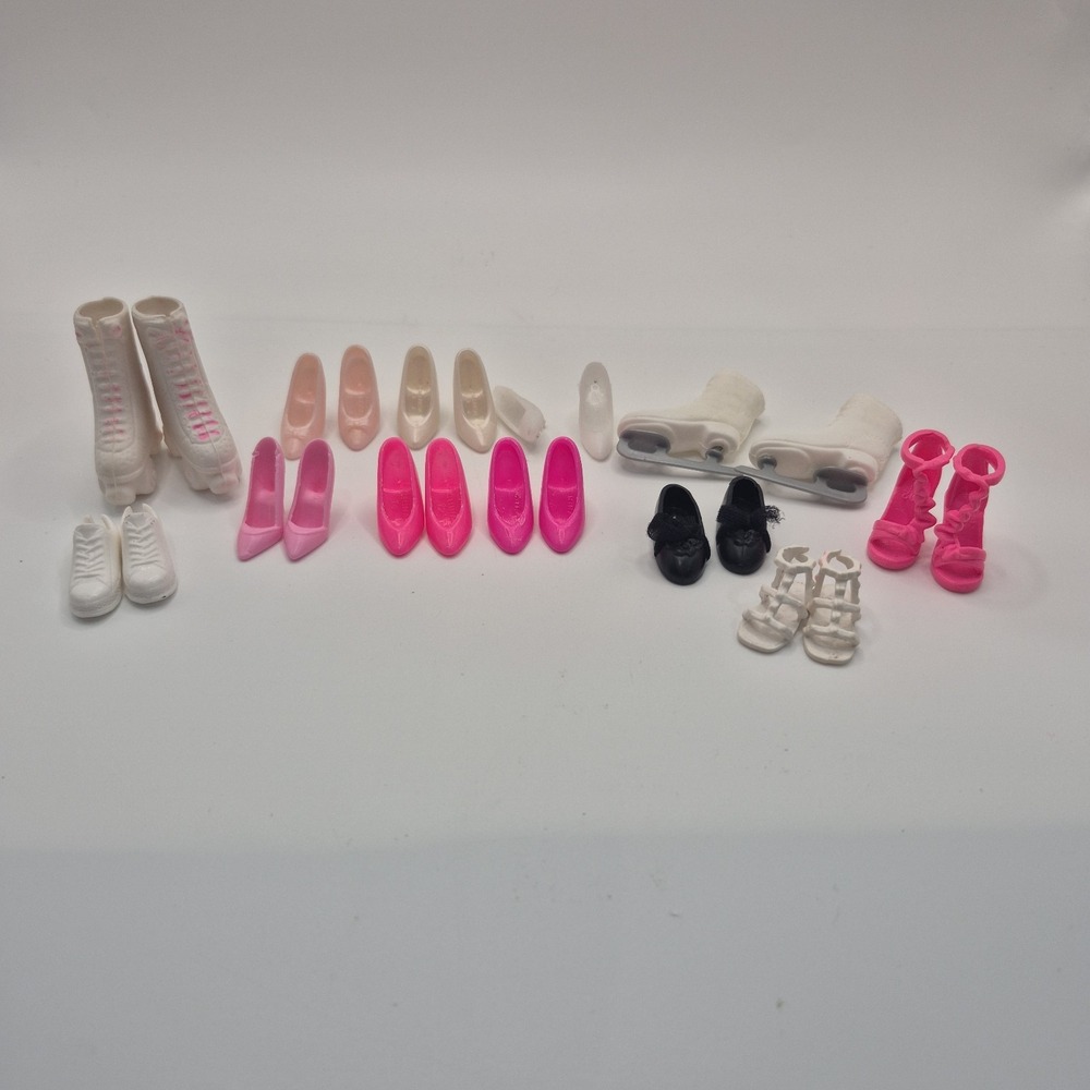 Lot of 12 Pairs of Vintage Barbie Shoes, Sandels, Skates And High Heels.